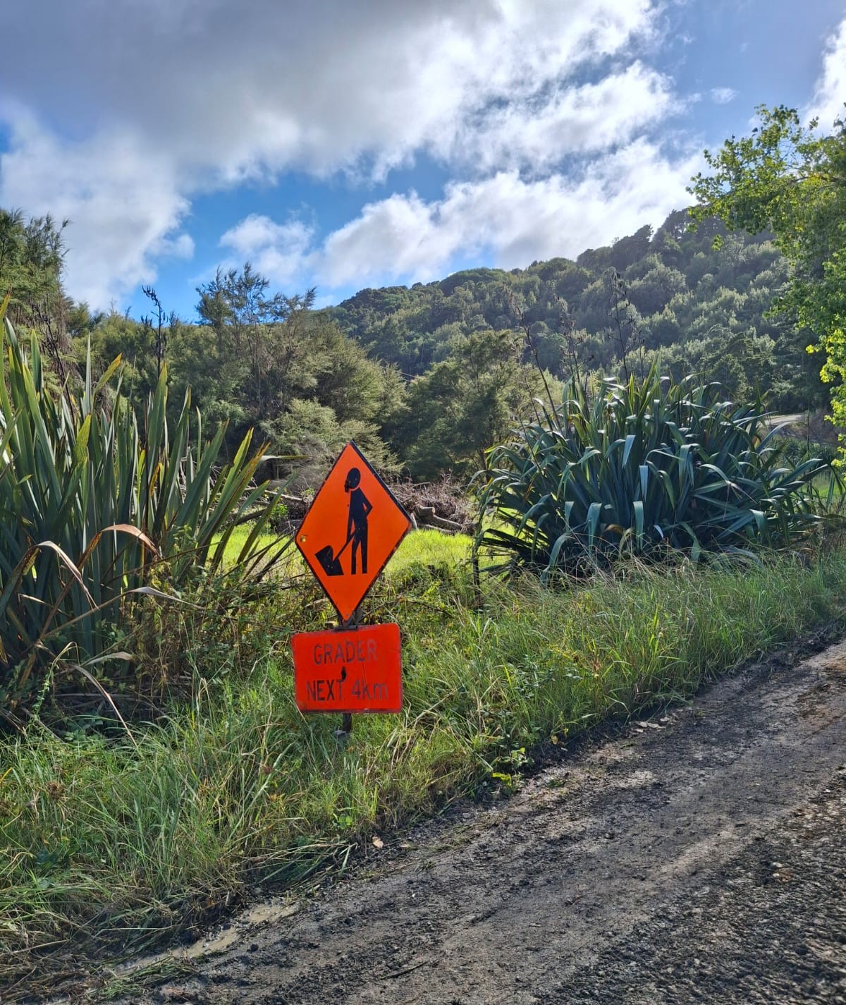 Grader sign on side of road