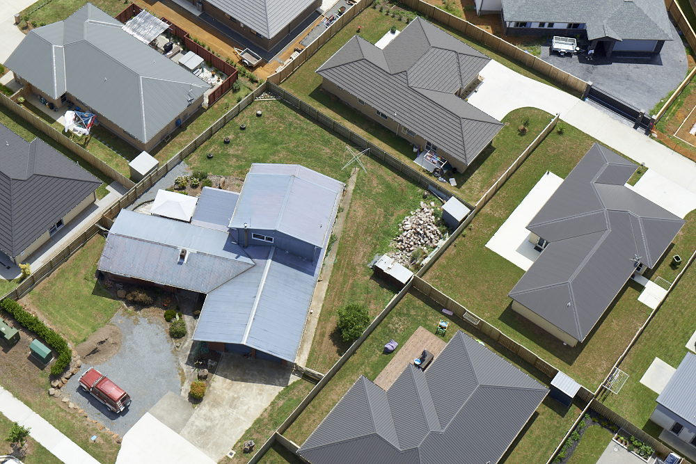 Photo taken above residential houses.