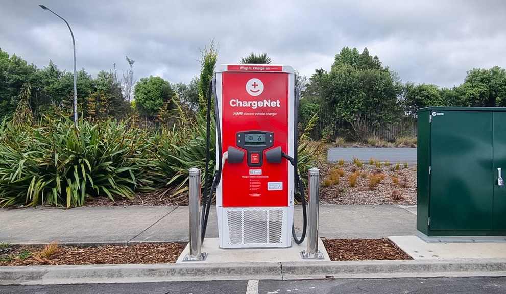 Red electric vehicle charging station, located in Tamahere.