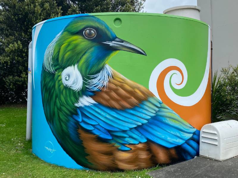 Tui bird mural on a local water tank